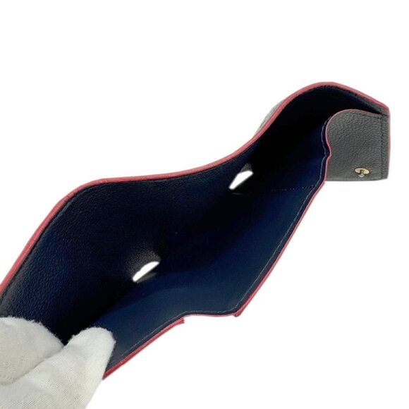 LOUIS VUITTON Brown Monogram Leather Wallet - Picture 9 of 10